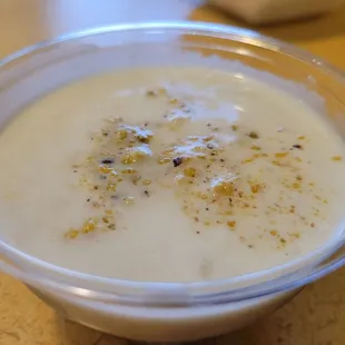 Creamy rice pudding topped with ground pistachio for dessert!