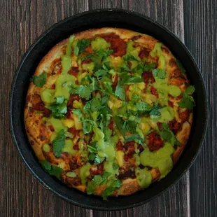 Try our new Caliente Al Pastor Pizza!