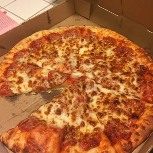 Large pepperoni pizza.