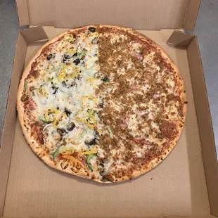 I thought this pizza I made looked yummy! It's half works and half meats!