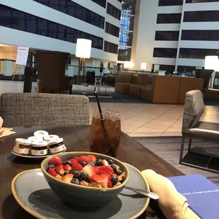 a bowl of fruit on a table