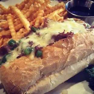 Philly beef, fries and a side of au jus.