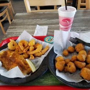 Ordered the cajun grilled fish with fried shrimp dinner and upgraded side item of fried mushrooms; included a beverage under $17 for all.
