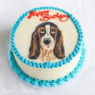 a birthday cake with a dog on it