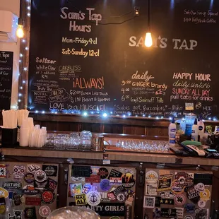 a glass of beer on a bar