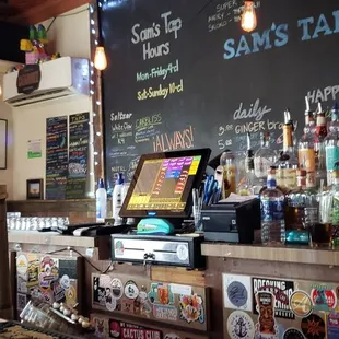 a bar with a chalk board