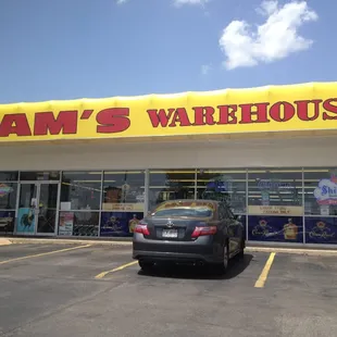 a car parked in front of the store