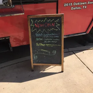 a chalk board with a menu on it