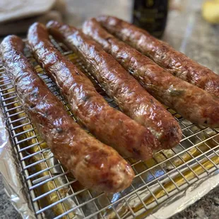Spicy sausages roasted in the oven