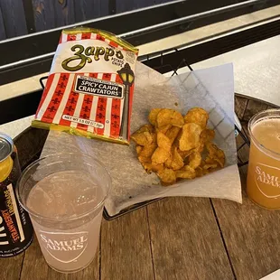 Spicy Cajun Crawtators chips with Wicked Hazy and Truly Strawberry Lemonade