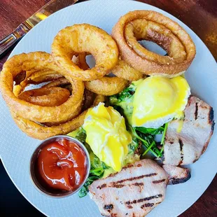 Dalkey Benedict with onion rings but replaced salmon with Irish rashers