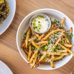 - Truffle Fries - 
 Truffle Oil, Grana Padano, Herb, Truffle Aioli