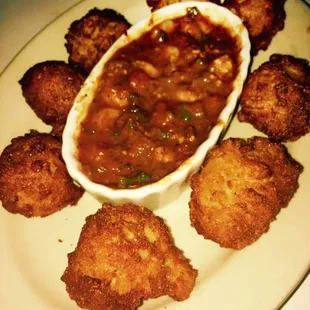 Creole shrimp, onion, bell pepper, celery, spicy tomato sauce, hush-puppies...