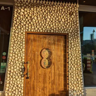 a door made out of seashells