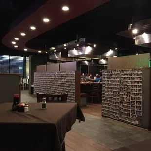 a view of a dining area with tables and chairs