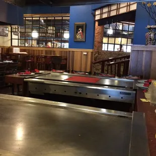 The restaurant seating and the cooking surface