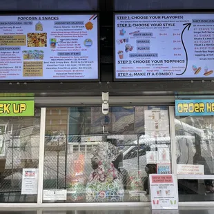 menus on the side of a building