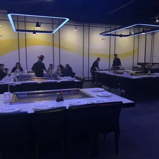 a group of people dining in a restaurant