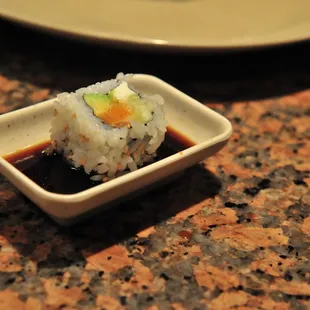 a small dish of sushi