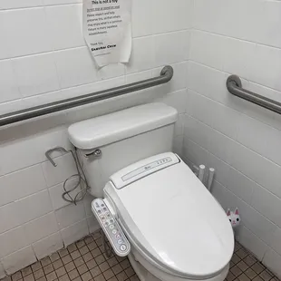 a toilet in a public restroom