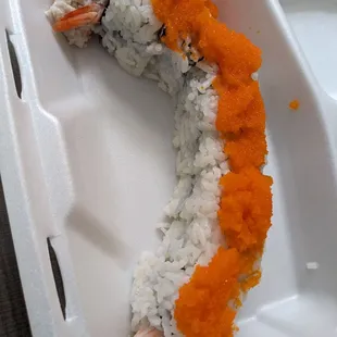 a close up of a roll of sushi