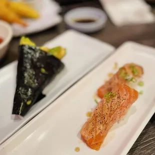 Avocado hand roll and seared salmon nigiri