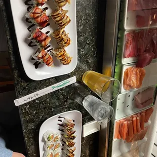 a variety of sushi on plates