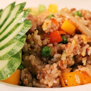 a plate of rice and vegetables