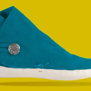 Our one button style moccasin. We have several style of moccasins to choose from and several colors to choose from as well.