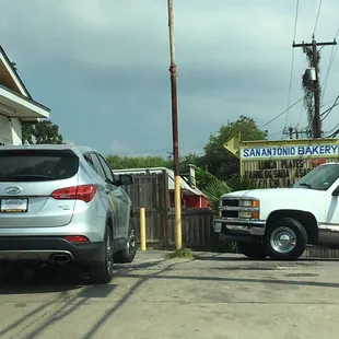 two cars parked in a parking lot