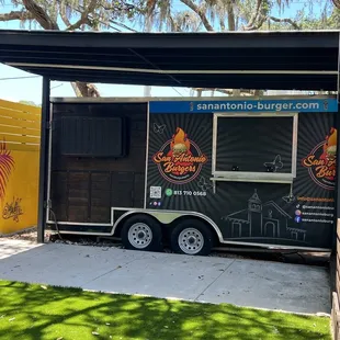 a food truck parked in front of a building