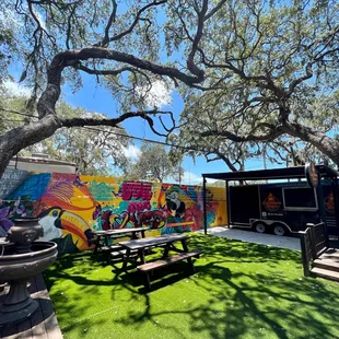 a colorful mural on the side of a building