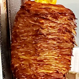 a large piece of meat on a rack