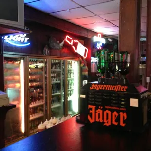 a bar with neon signs