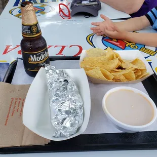 Bean and cheese taco, queso, and a Negra Modelo.