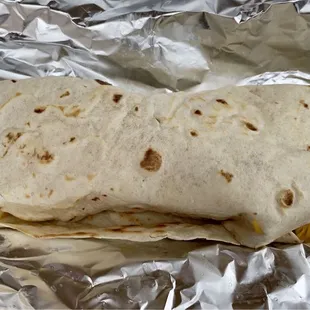 A massive Bacon, Potato, Egg, Bean and Cheese Burrito is the best compliment to a warm homemade cup of coffee on a Sunday morning