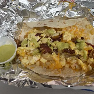 This Giant Breakfast Burrito/Taco is a Bargain for only $4.95, and with that, Salsa Verde for sure is delicious