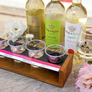 a variety of wines on a barrel