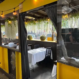 Outdoor &quot;patio&quot; w/ plexiglass in bkground w/ hanging flowers &amp; 2/3&apos;s of shed OPEN-AIR in foreground (TY for these pics &amp; Ur help, Mierco!)