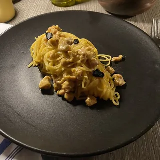 Tajarin Al Ragu Di Coniglio E Battuto Di Olive