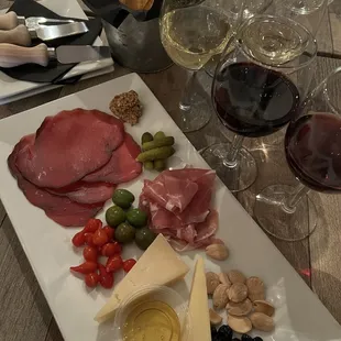 a platter of meat and cheese