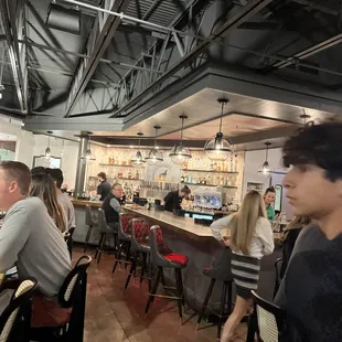 people sitting at the bar