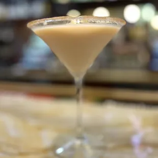 a martini glass on a table
