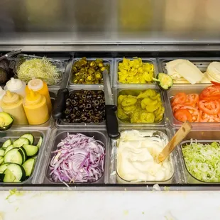a variety of salads and condiments