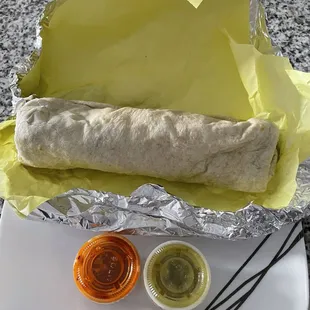 steak breakfast burrito. comes with green and red salsa