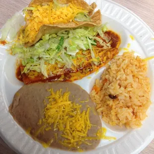 Combo #1: beef taco, cheese enchilada w/ rice and beans.