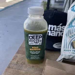 a bottle of green smoothie