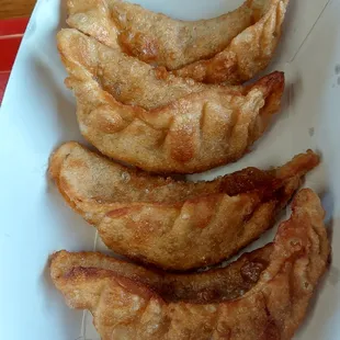 six dumplings per order, I ate to of them.  Ymmy!