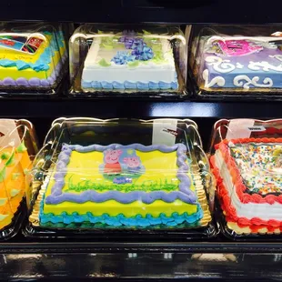 a variety of decorated cakes