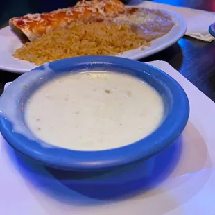 a plate of food and a bowl of soup